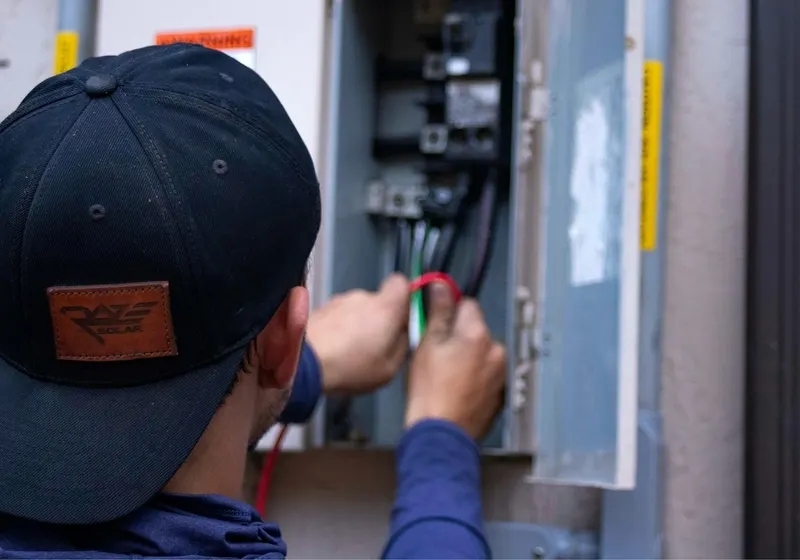 Electrician repairing wiring
