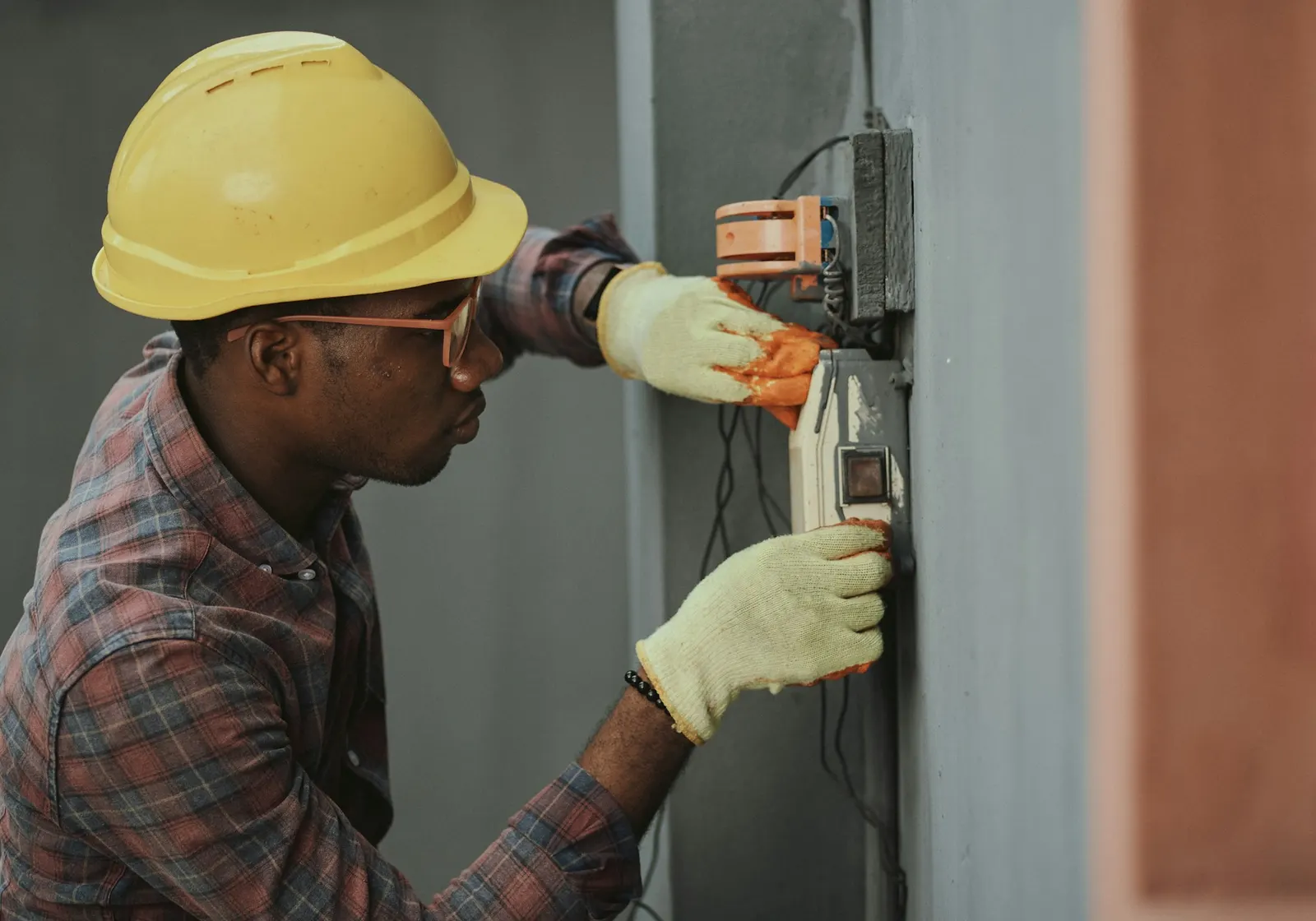 Electrician working on a home electrical panel